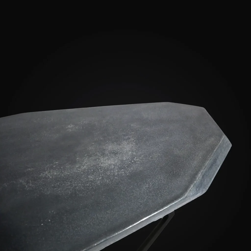 A Unique Concrete Coffee Table. Design inspired by an interstellar astroid. a one-of-a-kind artisan finish polished concrete tabletop with designer patina finish steel frame legs. A modern industrial and contemporary infused designer coffee table.