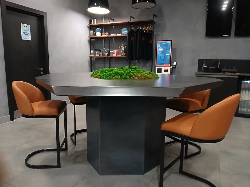 Large multi-angled unique GFRC boardroom island bar table with integrated preserved moss planter, Moorgate London.