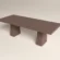 Concrete-dining-table-pedestal-handmade-london-uk Bespoke concrete dining table with architectural trapezoid double pedestal base. Top view of table, finished in earthy colour polished concrete.