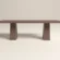 concrete-dining-table-rectangular-double-scultural-pedestal-base-clay-uk-london Rectangular concrete dining table with double pedestal base. Side view of table, finished in earthy colour polished concrete.