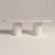 concrete-diningg-table-uk-oval-bespoke-size-london-UK Pill shaped, oval dining table. Made with gfrc concrete. Shown from side view in off-white polished concrete finish.