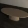 oval-dining-table-concrete-pedestal-base-top-view Oval dining table with pedestal base. Top view of table, made with gfrc concrete, in sand colour. Japandi style design.