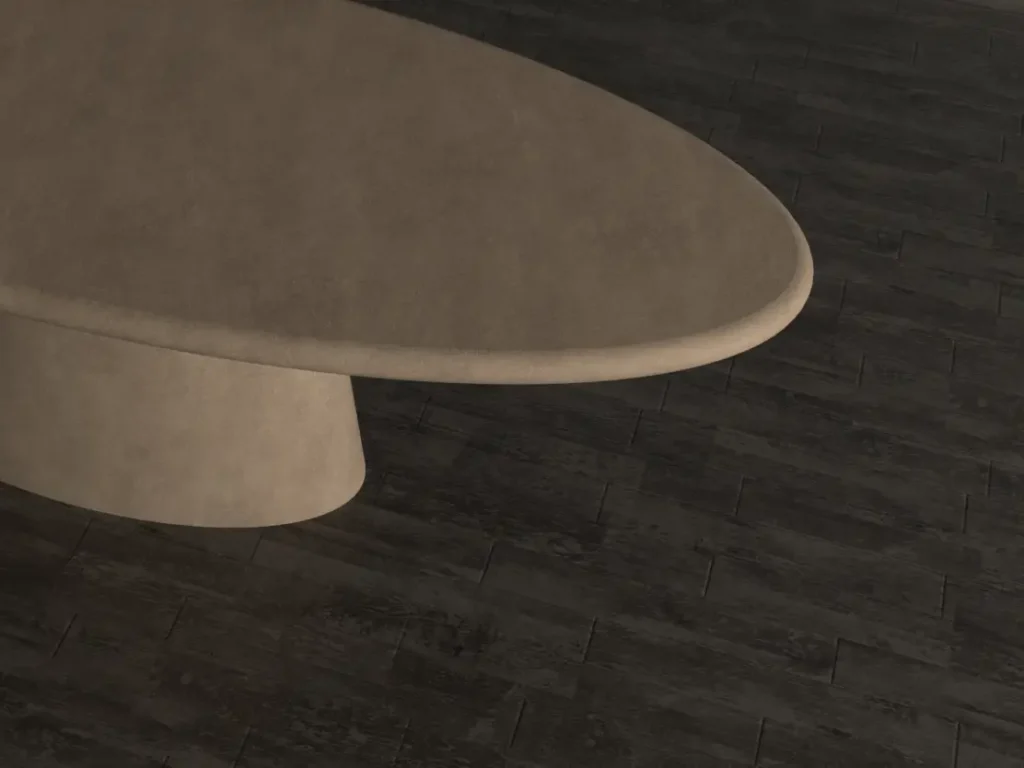 Oval concrete dining table close-up shot.