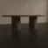 pill-shape-concrete-dining-table-double-pedestal-lower-back Pill shaped, racetrack dining table. Made with gfrc concrete. Shown in lower back angle.