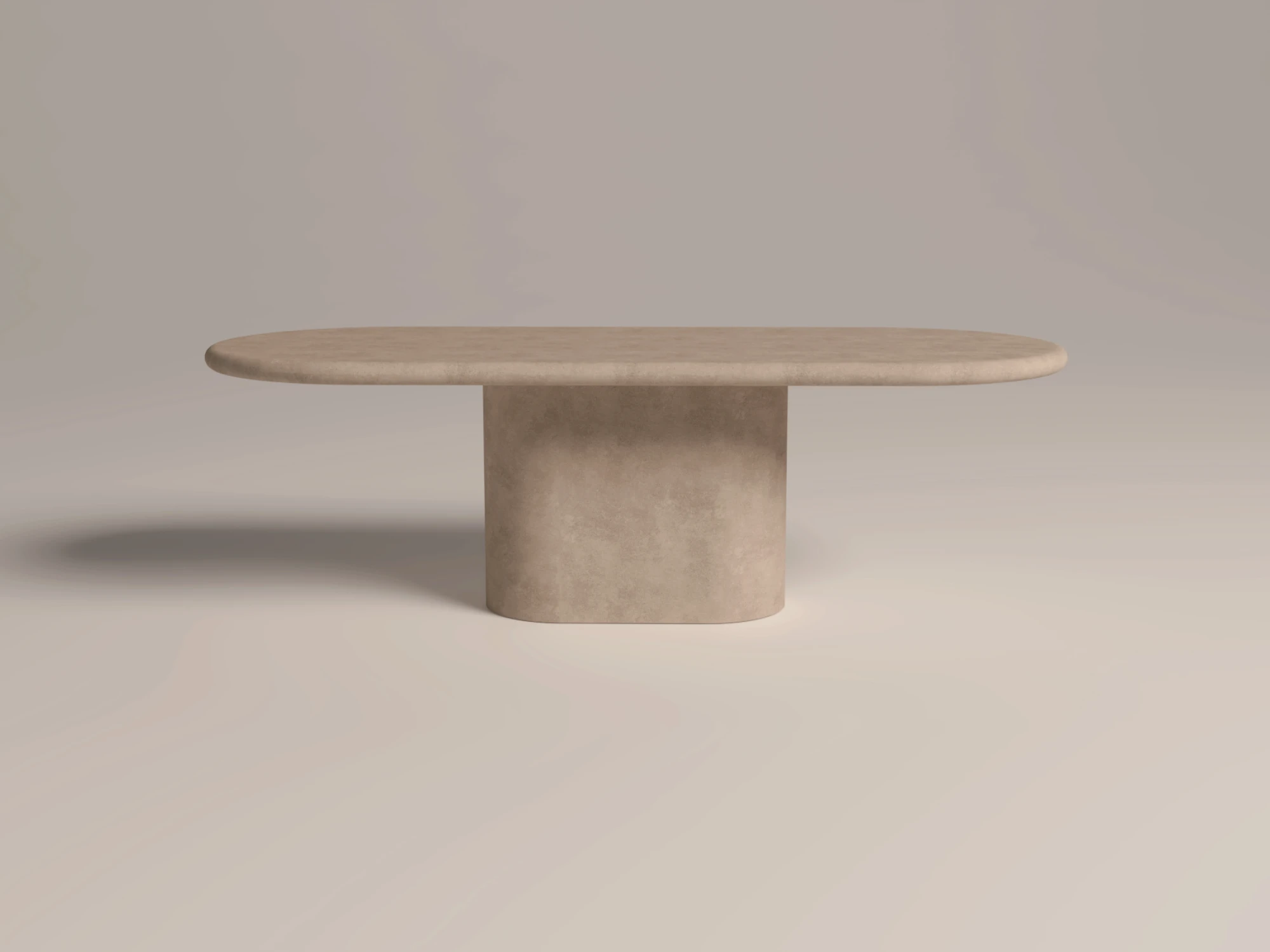 Pill-shaped, round and soft edge pedestal base dining table. racetrack shaped top has a matching pedestal base, finished in clay colour polished concrete. shown in soft light side view shot in London Studio UK.