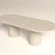 pill-shaped-oval-concrete-dining-table-london-uk-nature-colour-cross-view Oval Concrete Dining Table with double column base. top view in sand dune finish -handmade by GumiWorks London Studio.