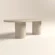 pill-shaped-oval-dining-table-polished-concrete-soft-minimalist-perspective-view-uk Pill shaped, oval racetrack dining table with double pedestal base. Made with gfrc concrete. Shown in lower back angle.