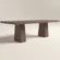 rectangular-dining-table-bespoke-concrete-double-pedestal-minimalist-london Rectangular concrete dining table with architectural trapezoid double pedestal base. Lower back view of table, finished in earth colour polished concrete.