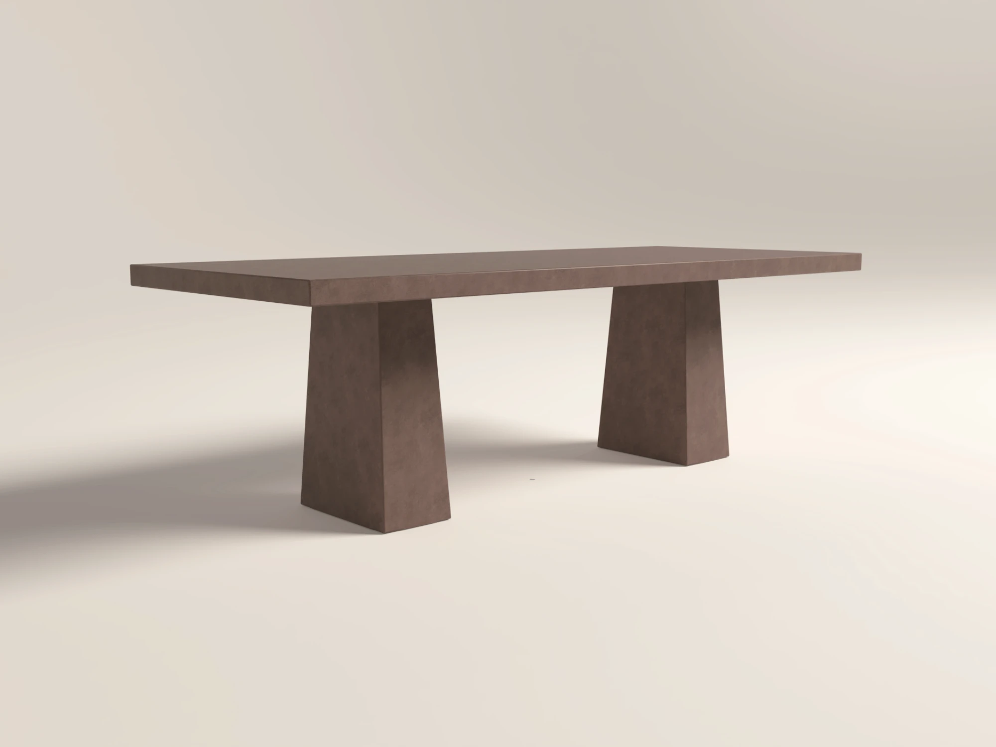 rectangular-dining-table-bespoke-concrete-double-pedestal-minimalist-london Rectangular concrete dining table with architectural trapezoid double pedestal base. Lower back view of table, finished in earth colour polished concrete.