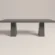 rectangular-dining-table-concrete-double-architectural-pedestal-side-london-uk Concrete dining table with architectural trapezoid double pedestal base. Side view of table, finished in anthracite colour polished concrete with modern minimalist design.