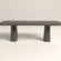 rounded-rectangular-concrete-dining-table-double-pedestal-anthracite-side-london-uk Rounded rectangular concrete dining table with sculptural double pedestal base. Side-view of table, finished in anthracite colour polished concrete - London UK.