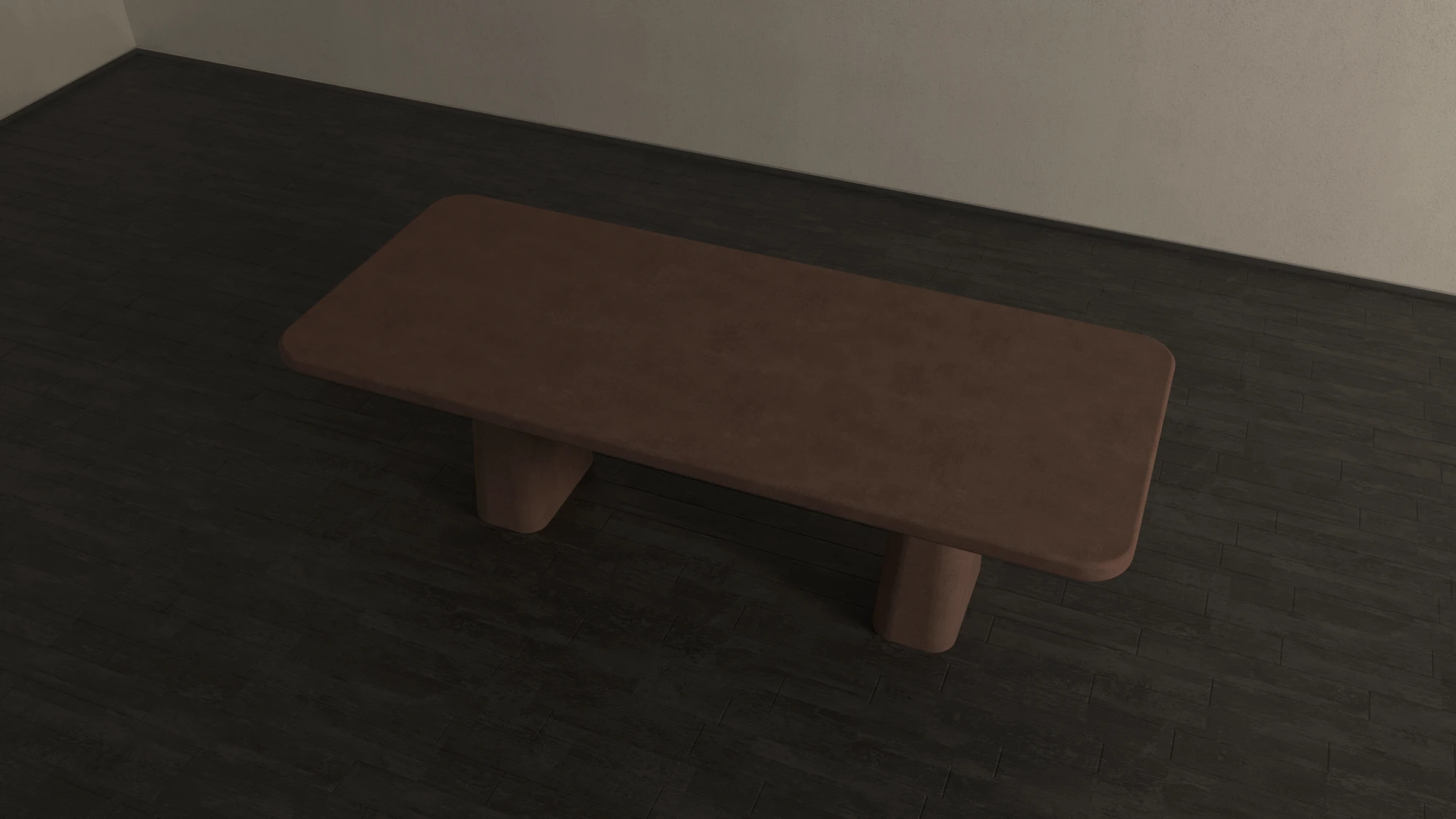 Rounded rectangular concrete dining table with sculptural double pedestal base. Top view of table, finished in clay colour polished concrete - London UK.