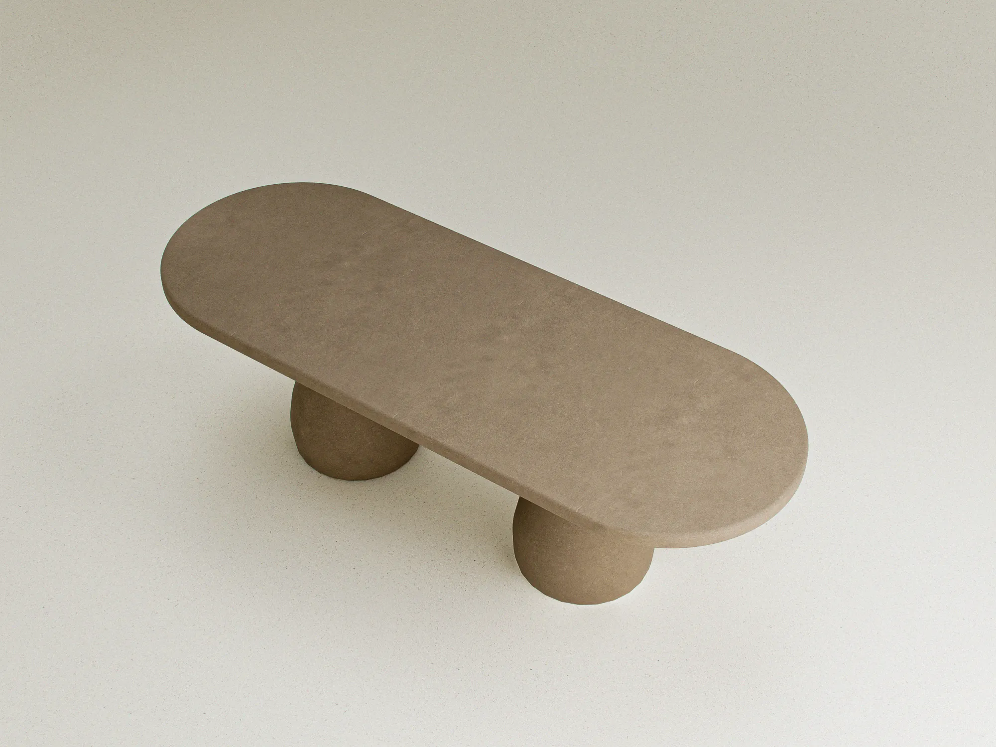 oval-luxury-dining-table-handmade-cast-concrete-london-uk Top-view of sculptural concrete dining table with double organic pedestal bases. Handmade in London UK.